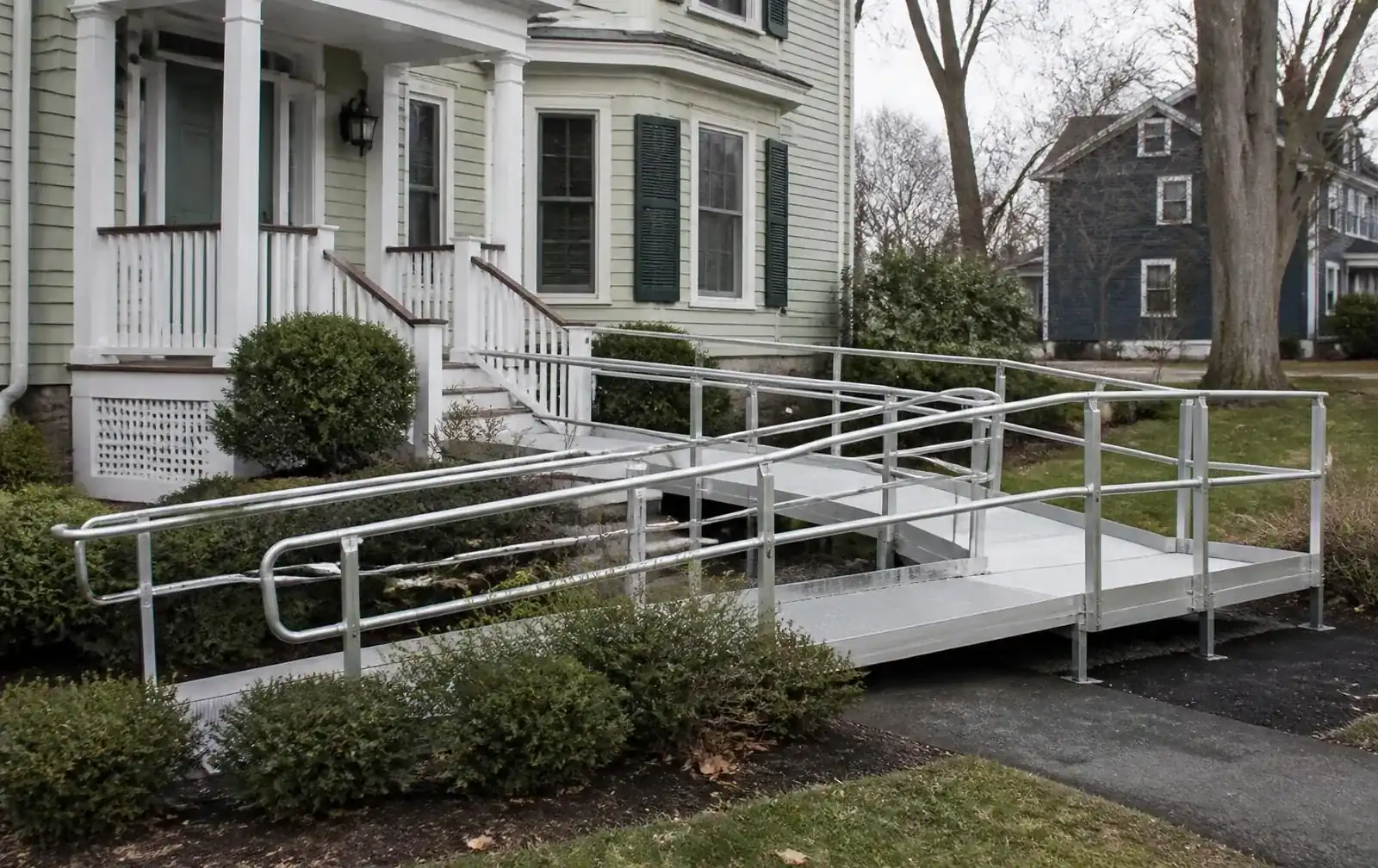 Switchback modular aluminum ramp at an Auburndale clapboard home