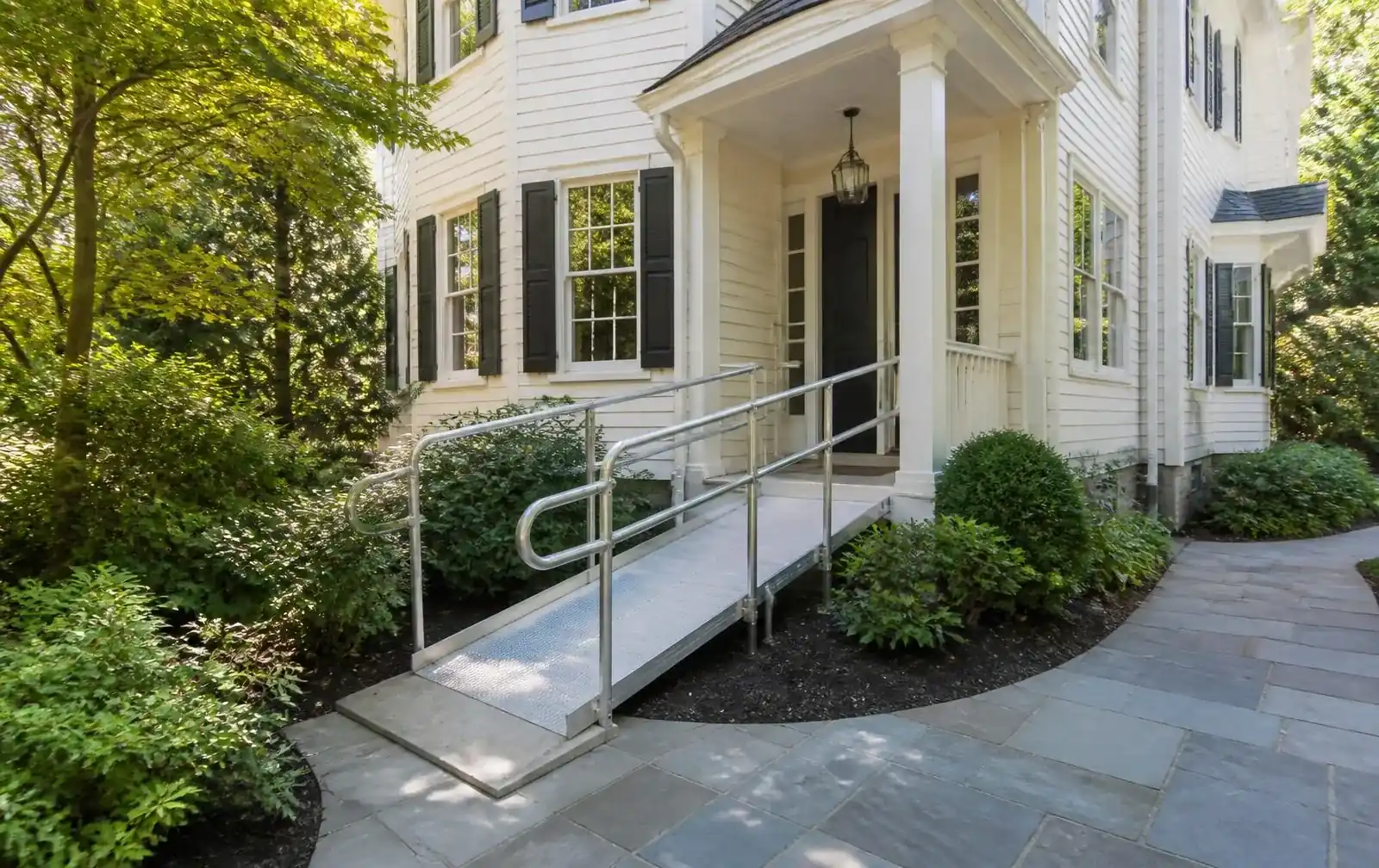 Modular aluminum access ramp at a leafy Newton Centre Colonial home